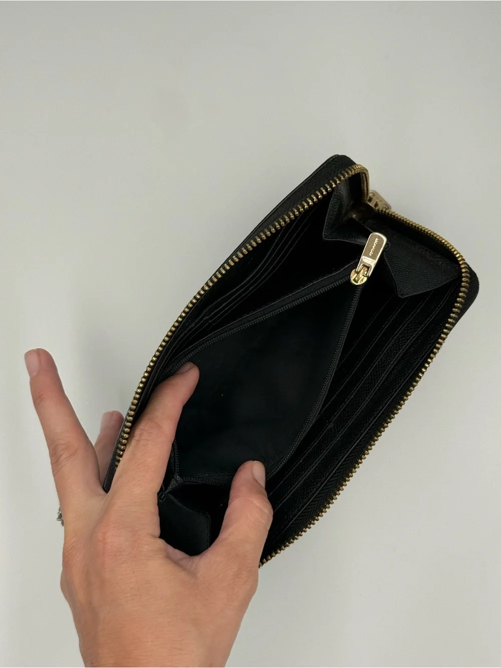 Coach Black Zip-Around Saffiano Leather Wallet with Gold Logo